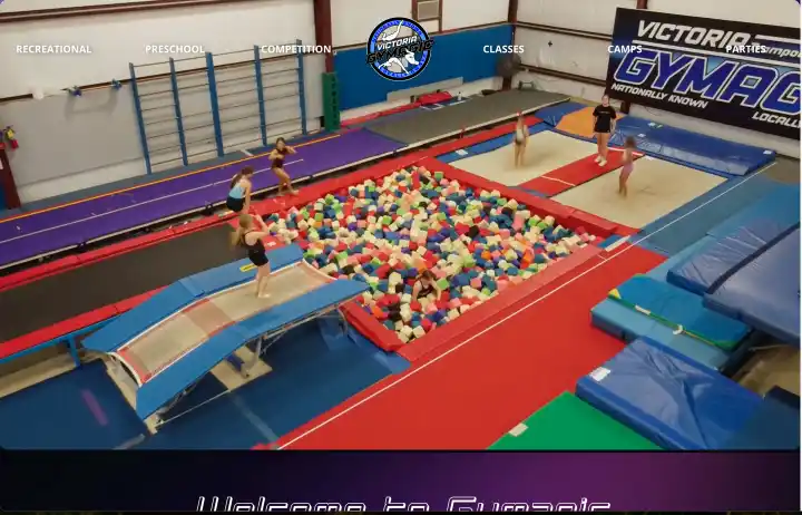 Screenshot of the homepage of the Victoria Gymagic Homepage, designed and built by BrandUs of Victoria, TX