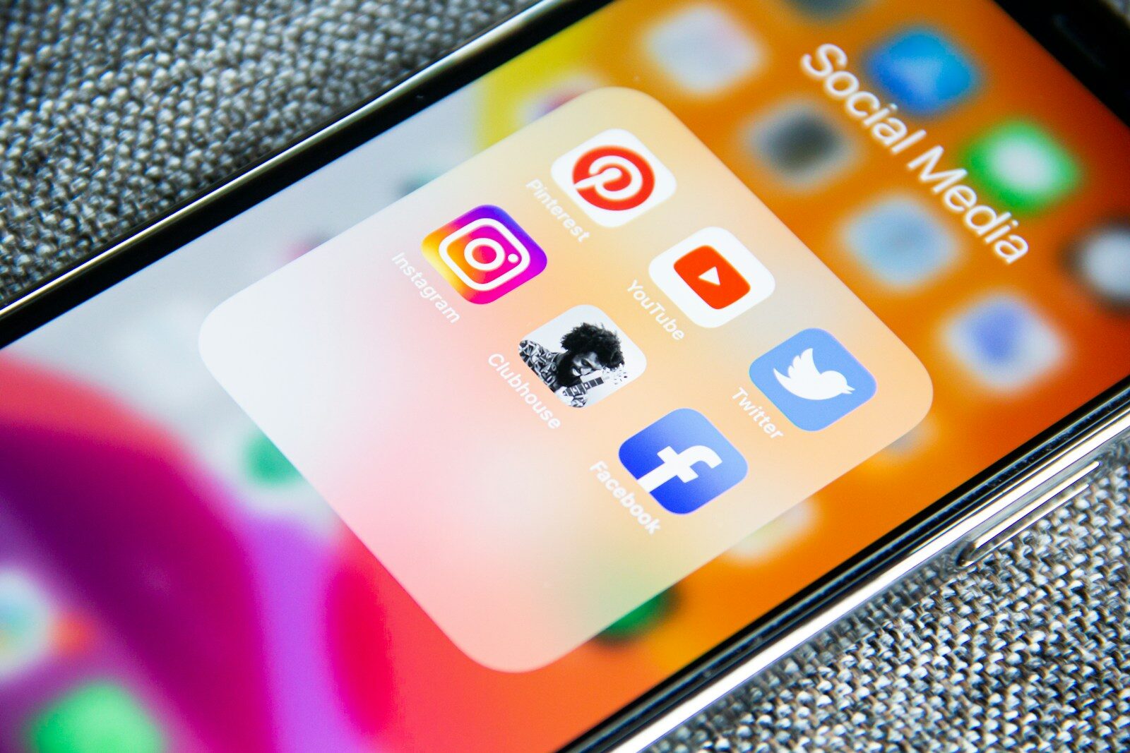 Social media app icons on a smartphone, social media marketing Victoria TX